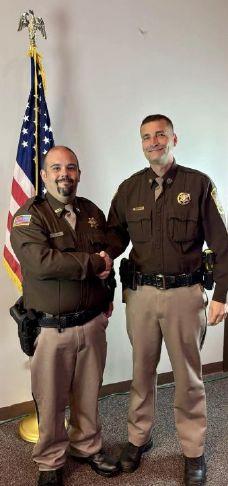 pictured left to right new school resource officer deputy shannon oday and sheriff shawn webster